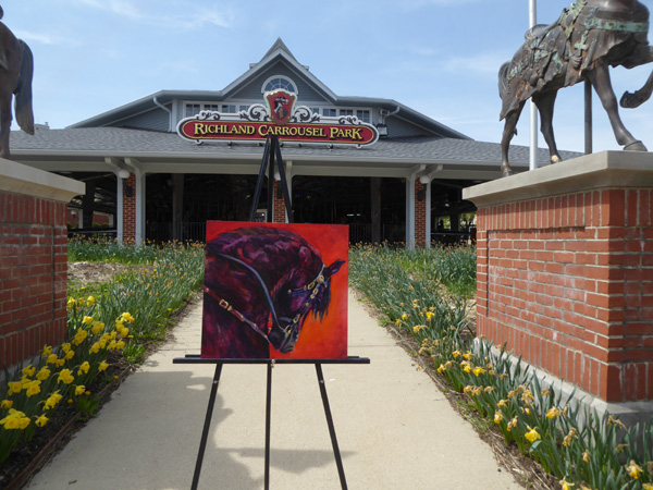 Richland Carrousel with a painting by equine artist Karen Brenner